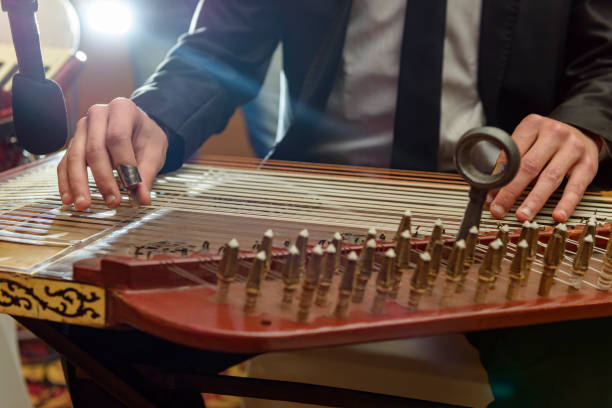 istock Playing Arabian Qanon Musical Instrument 1243383718