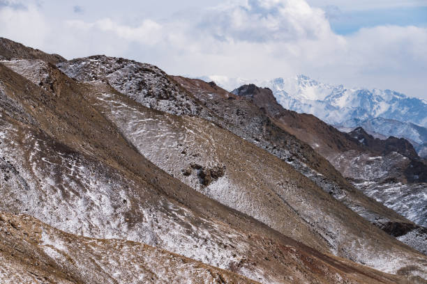 istock lanscape with barren mountain which is covered with ice 1243387988