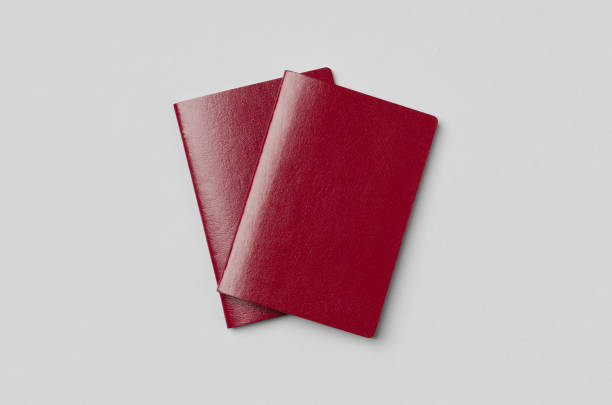 istock Two overlaping red passports mockup. 1243413066
