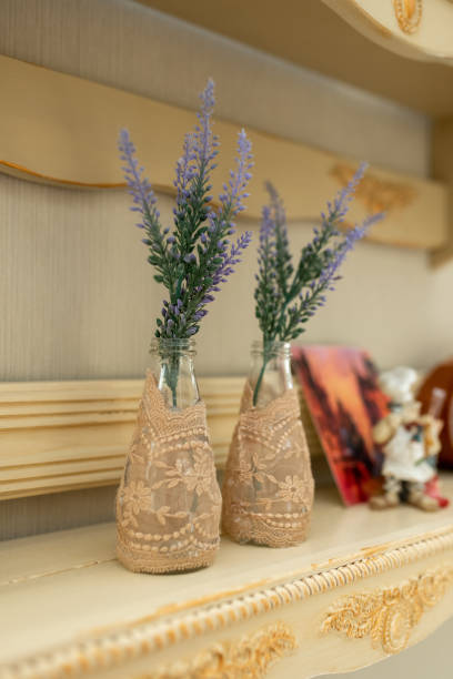 istock Flowers in a glass vase for home decor. 1243438450