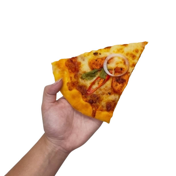 istock Isolated Hand holding pizza on white background with clipping path 1243446565