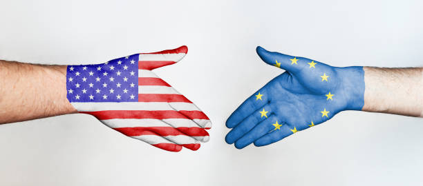 istock handshake of two countries USA and EU on a white background 1243447698