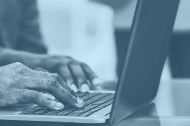 istock close up. employees work on a laptop at the workplace 1243451601