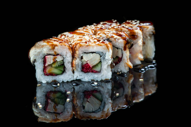 istock Sushi Roll On A Black Background reflection . Japanese food. Close Up. 1243456052