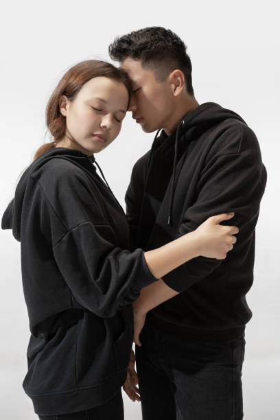 istock Trendy fashionable couple isolated on white studio background 1243462788