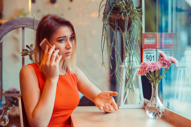 istock Frustrated sad woman talking on phone 1243490987
