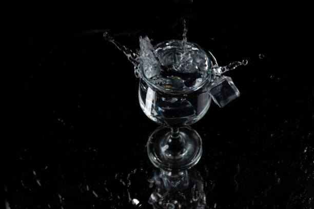 istock A splash with water and ice on a black background 1243495028