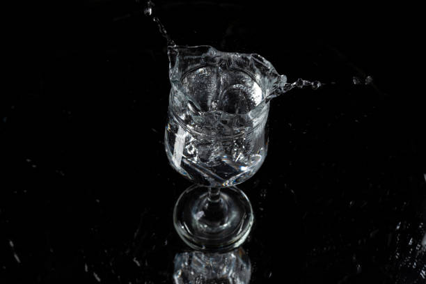 istock A splash with water and ice on a black background 1243495550