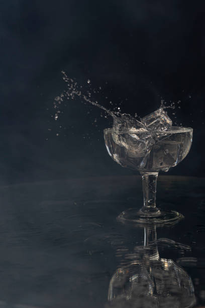 istock A splash with water and ice on a black background 1243495574
