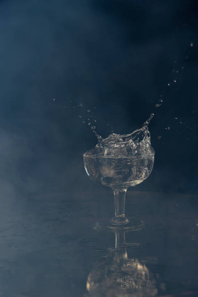 istock A splash with water and ice on a black background 1243495584