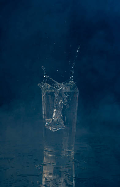 istock A splash with water and ice on a black background 1243495601
