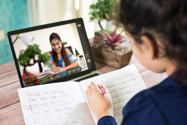istock Distance learning from home on video conference call 1243498441