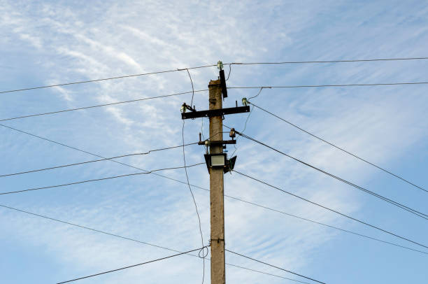 istock Pillar with wires against the sky. 1243500745