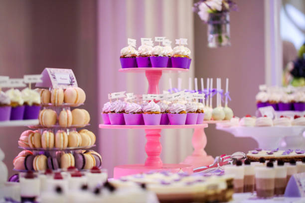 istock delicious candy bar with various sweets. cake pops, cupcakes, macaroons and others 1243505105