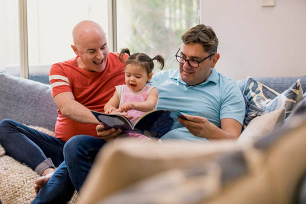 lesen mit grandaden - baby pointing child showing stock-fotos und bilder