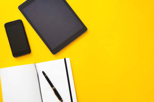 istock Open notebook with pen and moderndevices; tablet and movil for freelancer or working on line concept. 1243560669