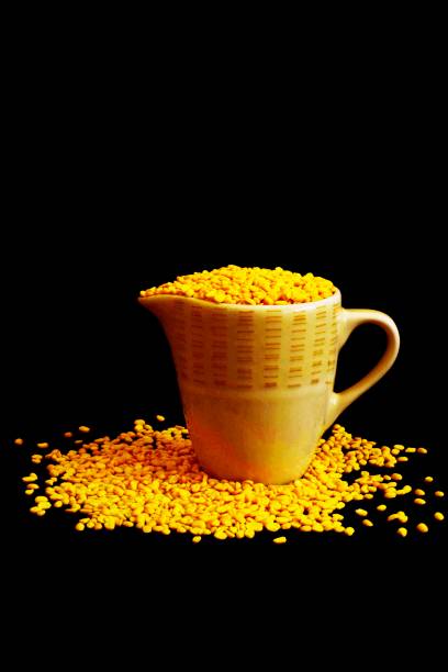 istock Mung beans in jug - black background. 1243587225