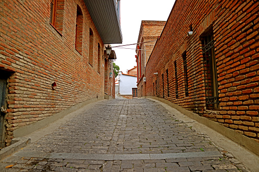 Narrow Alley with Bricked Buildings in the Old City of Tbilisi, Georgia