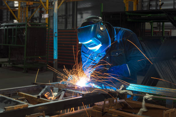 industrial welder - soldar imagens e fotografias de stock