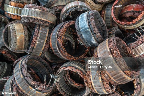 Scrap Yard Of Stator Plate And Wingdings In Ac Alternators For Recycling Copper Recycling From Stator Stock Photo - Download Image Now