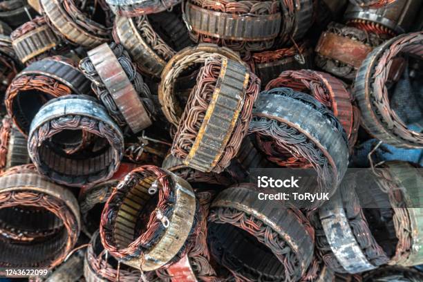 Scrap Yard Of Stator Plate And Wingdings In Ac Alternators For Recycling Copper Recycling From Stator Stock Photo - Download Image Now