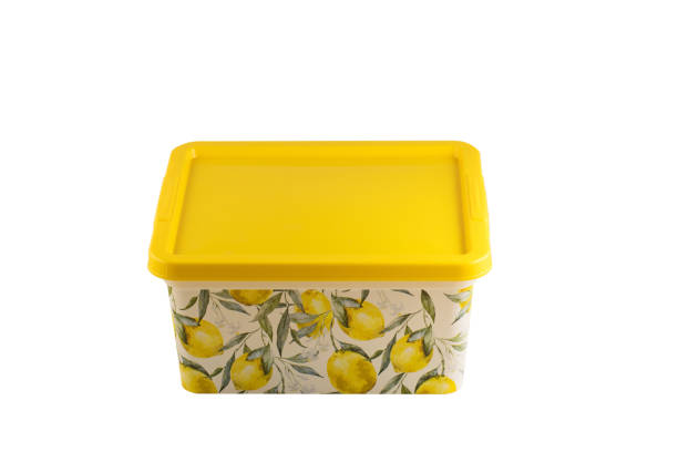 istock Plastic yellow storage box. Plastic colorful box. Plastic box isolated on white background. 1243622658