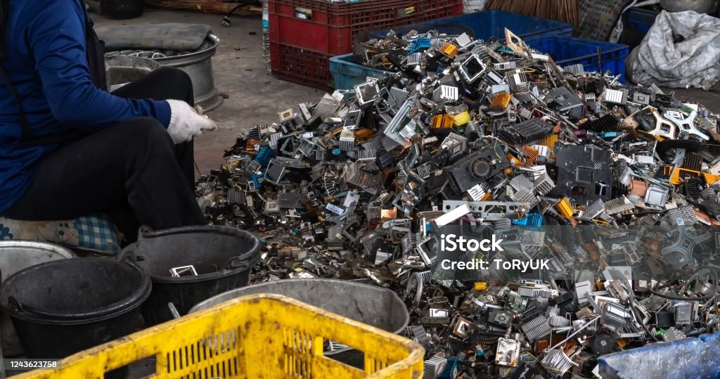 Scrap yard electronic waste for recycling Scrap yard electronic waste for recycling with selective focus. electronic aluminium waste E-Waste Stock Photo