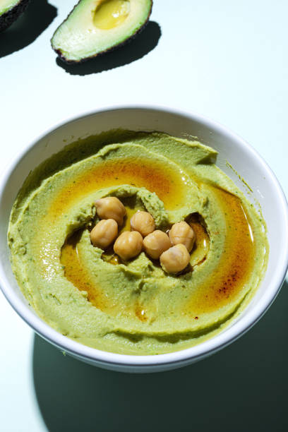 istock Homemade avocado and chickpea hummus 1243638948