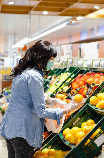 istock Woman shopping with a mask 1243643308