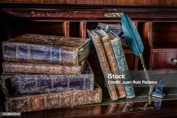 Old Books On Desk And Pen Writing Stock Photo - Download Image Now - Spain, Art, Author