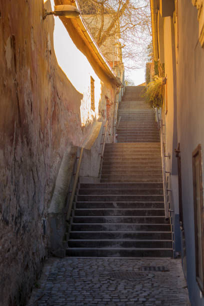 old narrow street with stairs, old town of Cesky Krumlov, Czech republic