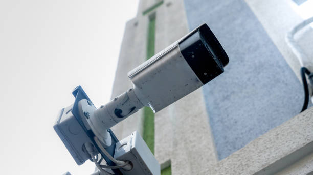istock Modern electronic surveillance camera installed on city street 1243667314