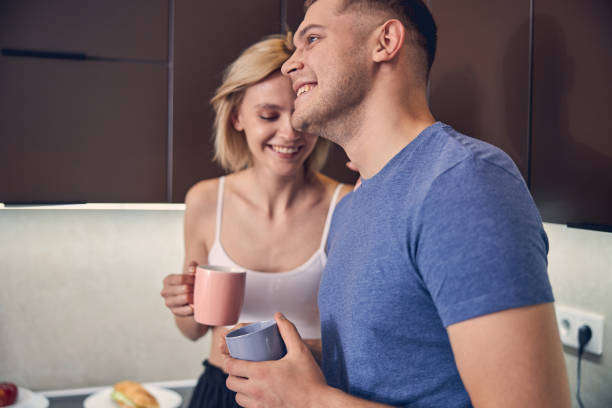 istock Young family couple spending time together in kitchen 1243668469