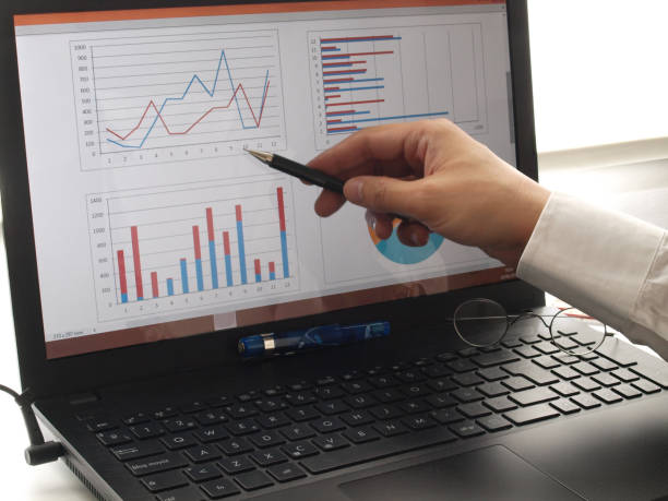 istock financial charts on laptop 1243685724