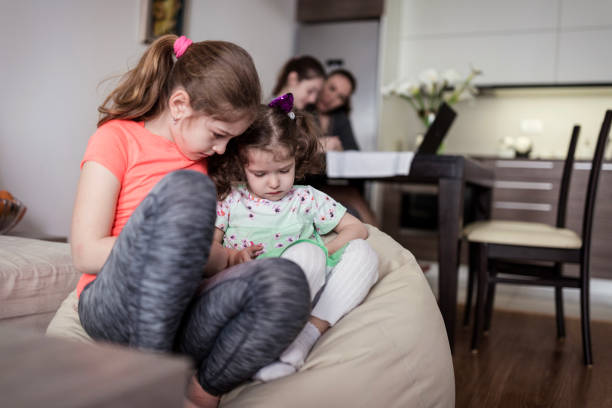istock Cute childre looking at phone 1243687993