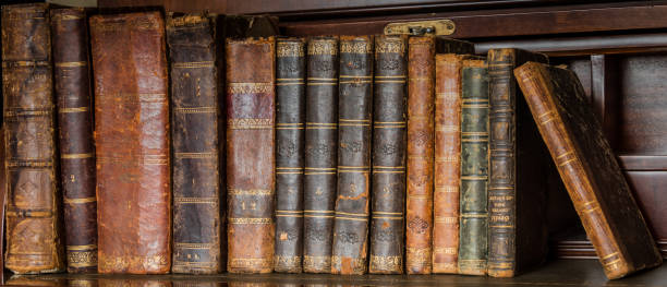 istock old books placed on wooden shelf 1243688538