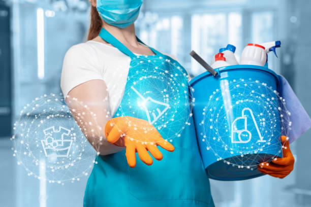 istock A cleaning lady shows a broom icon . 1243689089