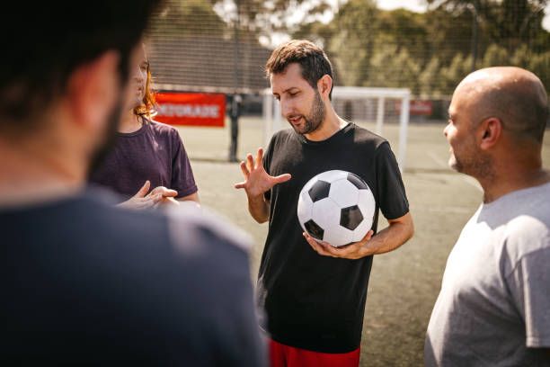 istock Male soccer team celebrating victory 1243699612