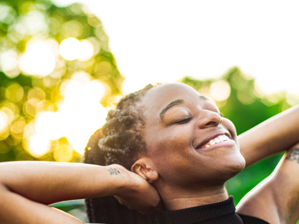 istock Dancing African woman in the park 1243718089