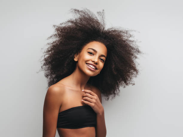 istock Beautiful girl with curly hairstyle 1243720848