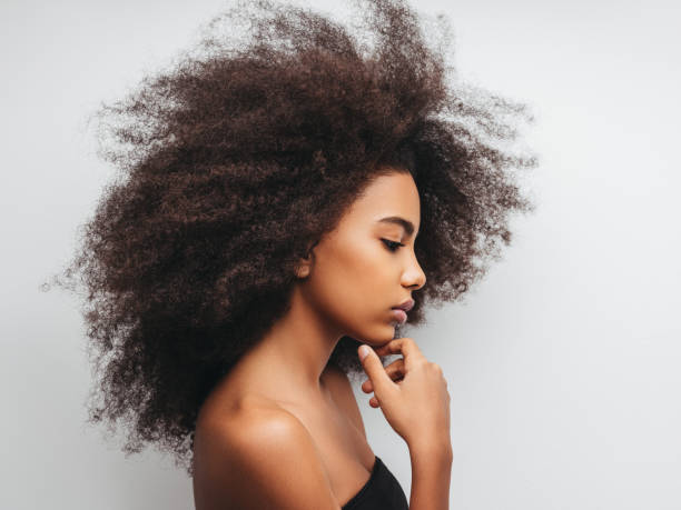 istock Beautiful girl with curly hairstyle 1243725211