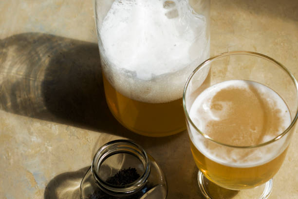 istock cold carbonated tea with lemon and ice, glasses on a light background, summer drinks, lemonade. 1243725733