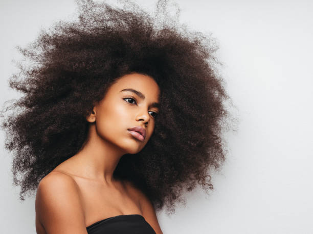 istock Beautiful girl with curly hairstyle 1243725736