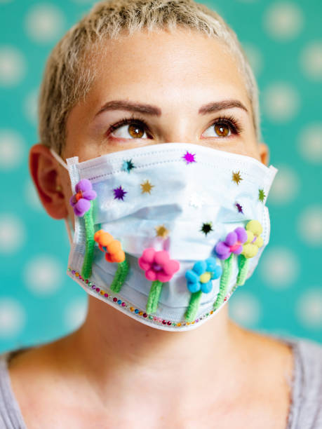 istock Young woman with artsy face mask 1243741966