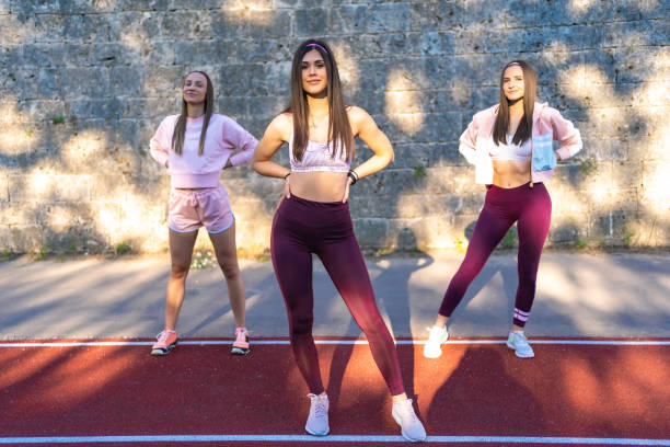 istock Three sports women standing together 1243753758