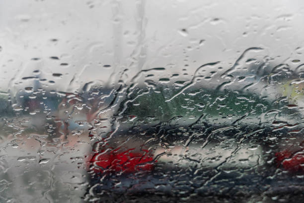 istock rain drops on car glass in rainy days 1243756384