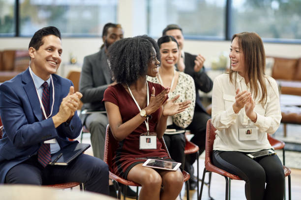 istock Corporate Seminar Participants Applauding Presentation 1243814626
