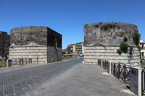 Capua - Towers of Phaedreic II Capua, Campania, Italy - May 22, 2020: Towers built by Frederick II of Swabia at the entrance of the city and the ancient Roman bridge then rebuilt in concrete after the bombings of 1943 capua stock pictures, royalty-free photos & images