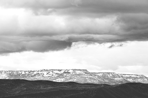 In Western Colorado Black and White Mountain Range Contrasting Nature Scene  on a Gloomy Cloudy Wintry Day (Shot with Canon 5DS 50.6mp photos professionally retouched - Lightroom / Photoshop - original size 5792 x 8688 downsampled as needed for clarity and select focus used for dramatic effect)