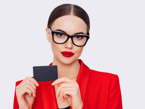 woman holds business card - glasses holding business card imagens e fotografias de stock